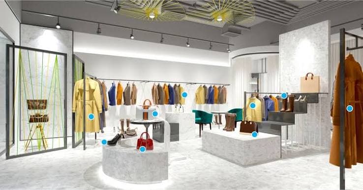 Illustrative showroom interior with furniture and a digital product interface